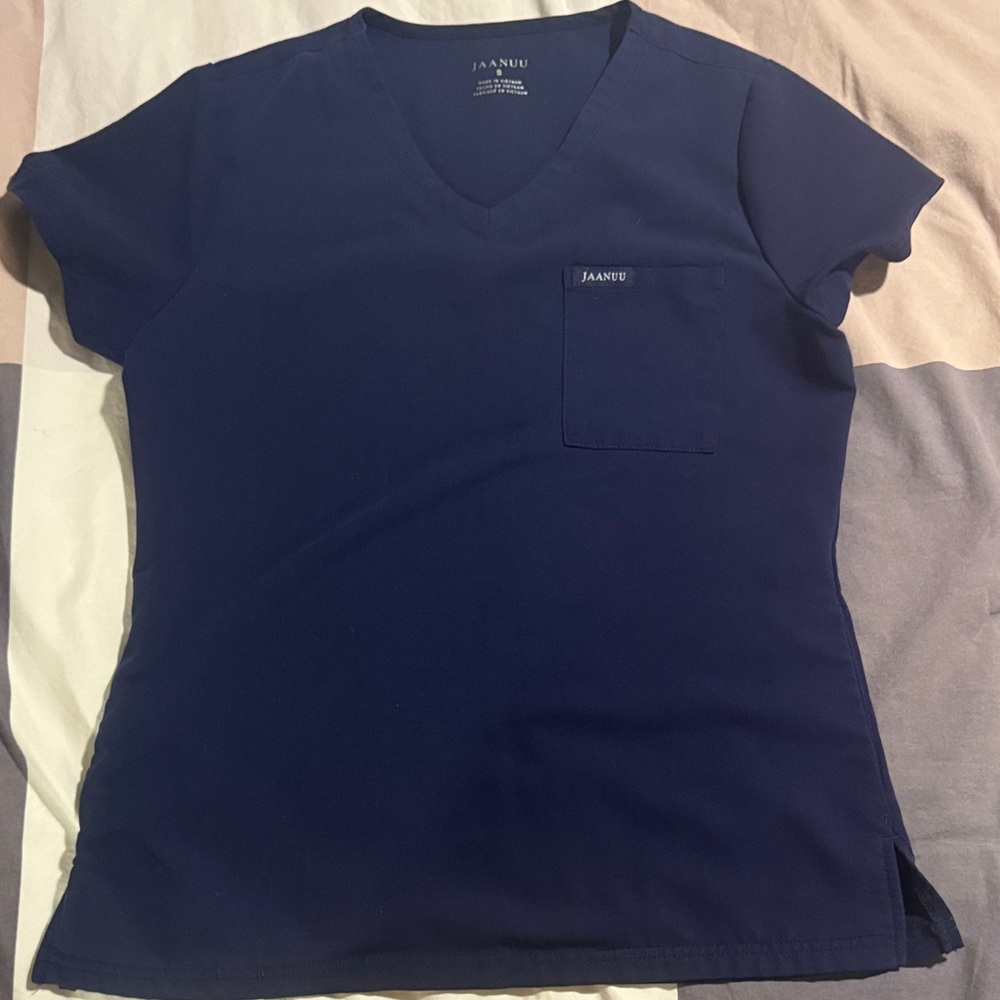 Jaanuu Women's  scrubs set  Navy Top and cargo style pants.